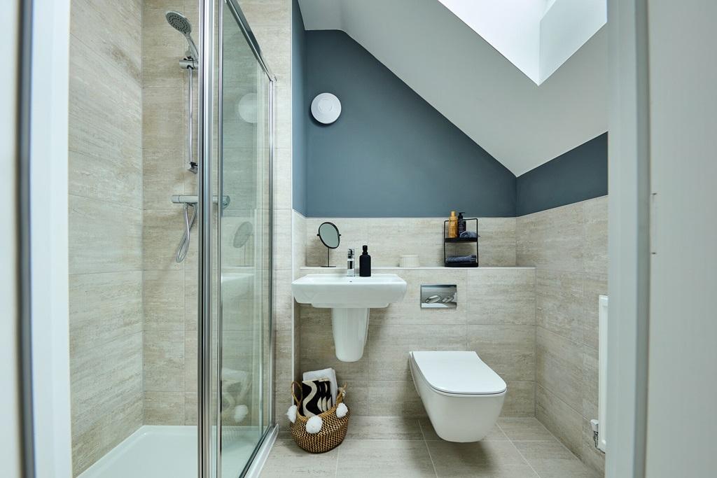 An additional shower room can be found on the...