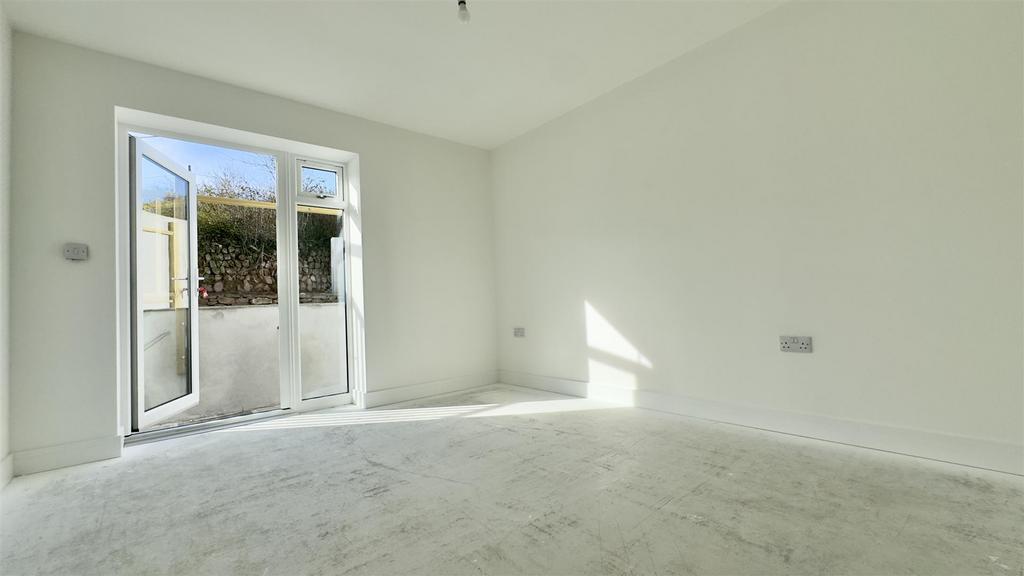 11 - Bedroom with French Doors to Garden.jpeg
