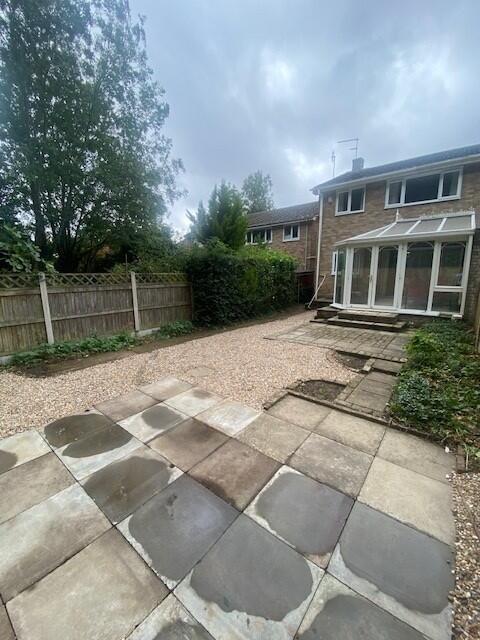 Private low-maintenance rear garden with patio...