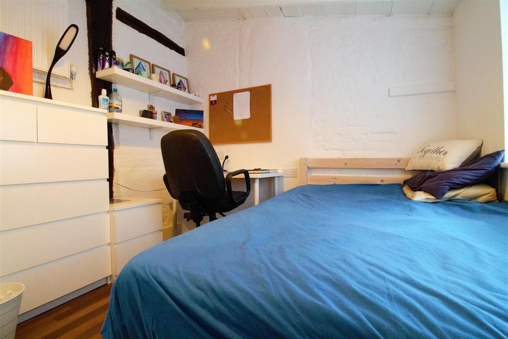 Cozy bedroom with desk, storage and comfy bed...