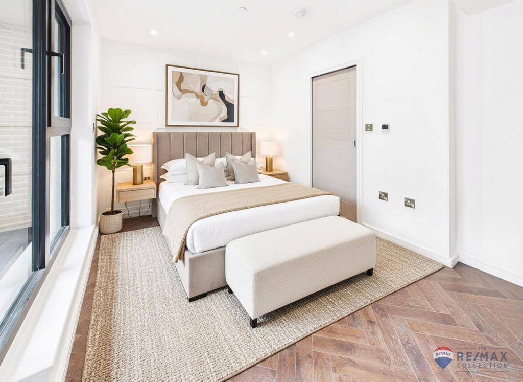 Virtually Staged Principal Bedroom.png