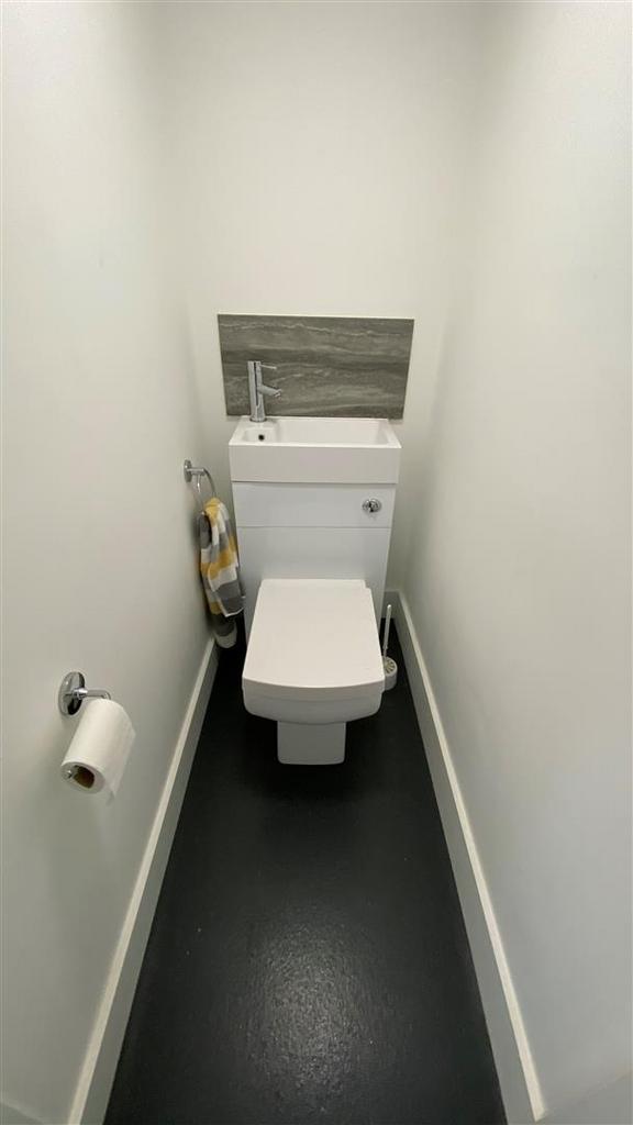 Neat modern WC with compact basin...