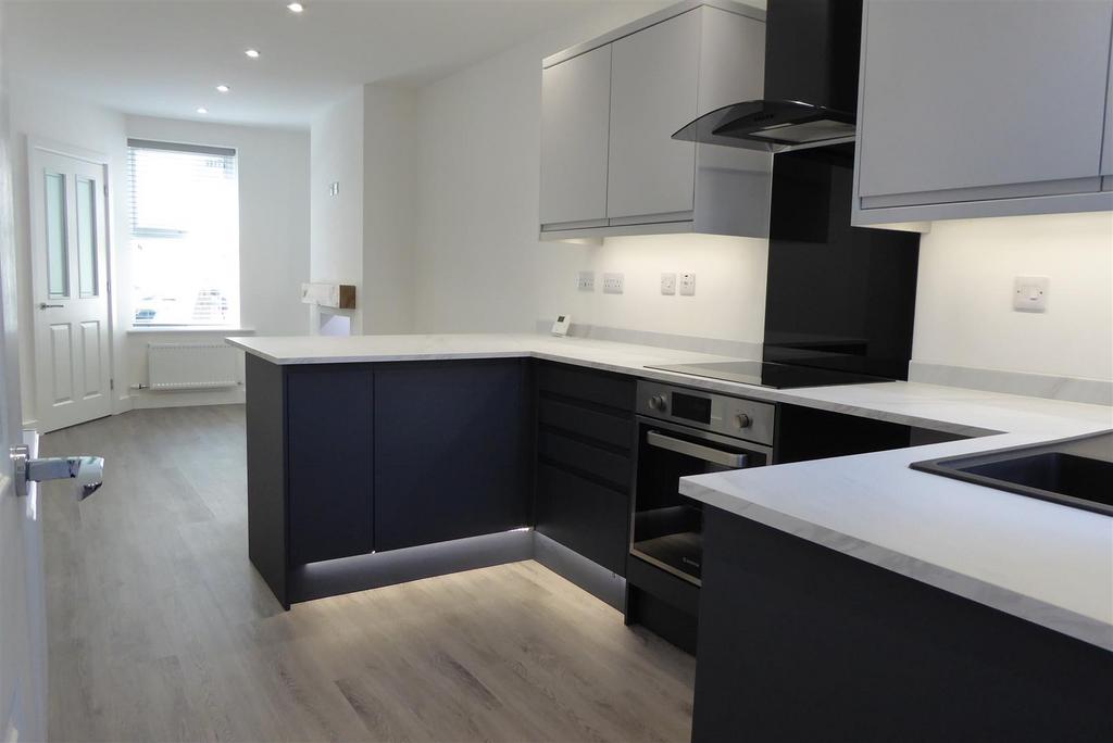 Open plan lounge/kitchen