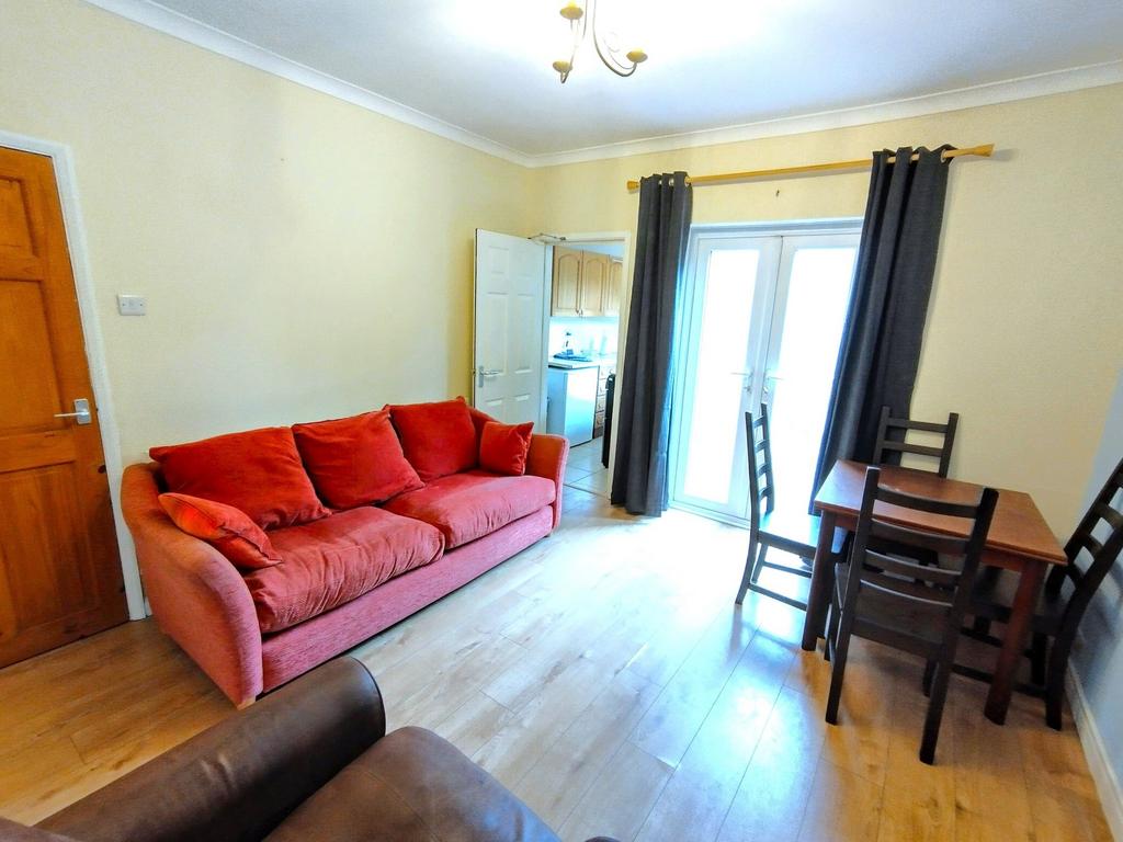 Bright furnished living room with a comfortable...