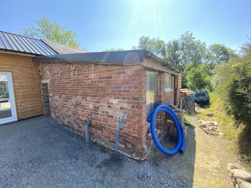 Barn conversion lean to store