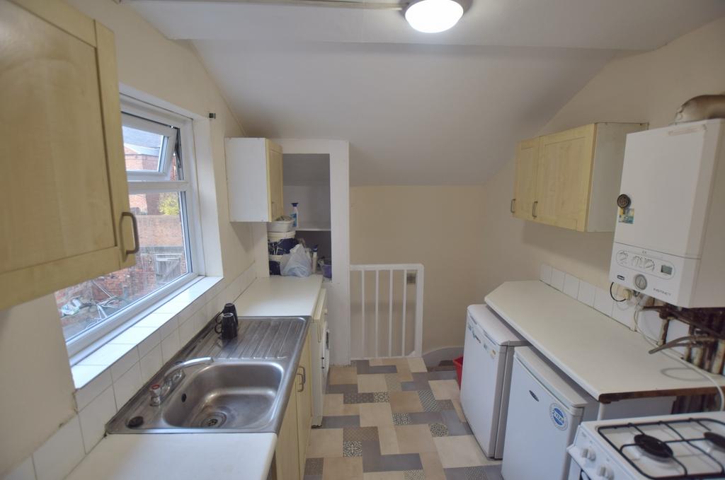 Bright and functional kitchen featuring ample c...