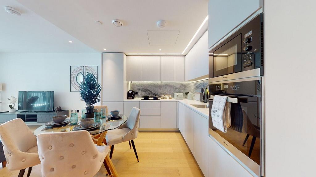 Modern open-plan kitchen and dining area...