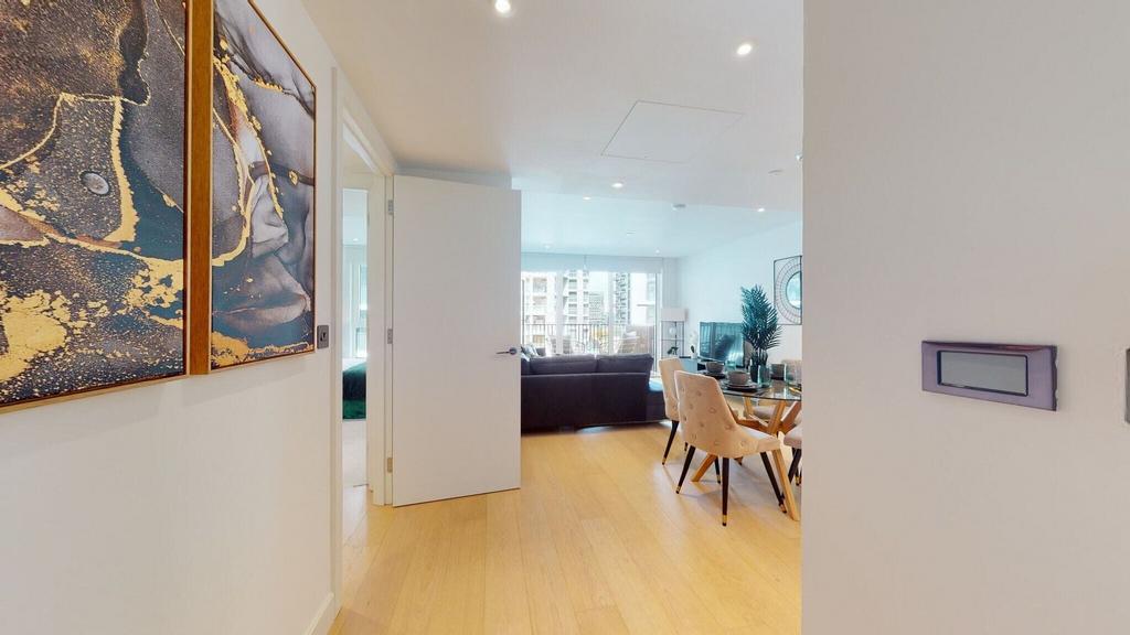 Bright open-plan living and dining with balcony...