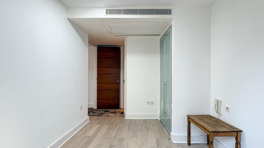 Bright and spacious hallway with modern finishe...
