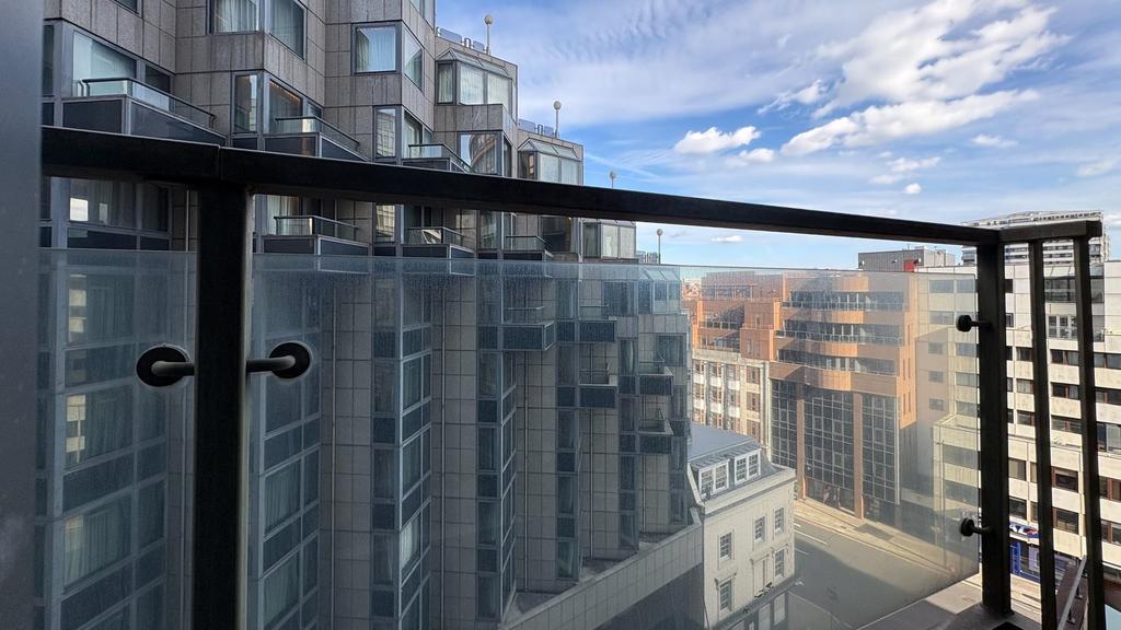 Bright urban balcony with stunning city views...