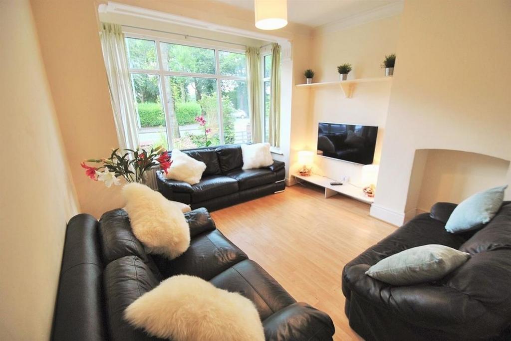 Bright and airy living room with stylish sofas...