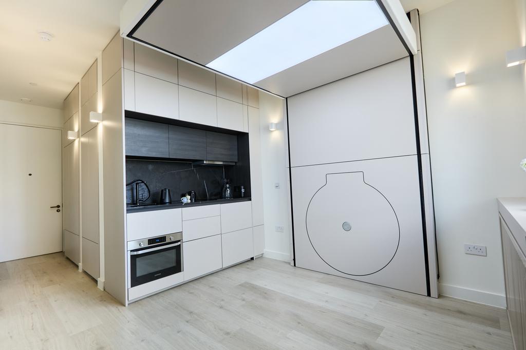 Integrated flip out table &amp; floating bed