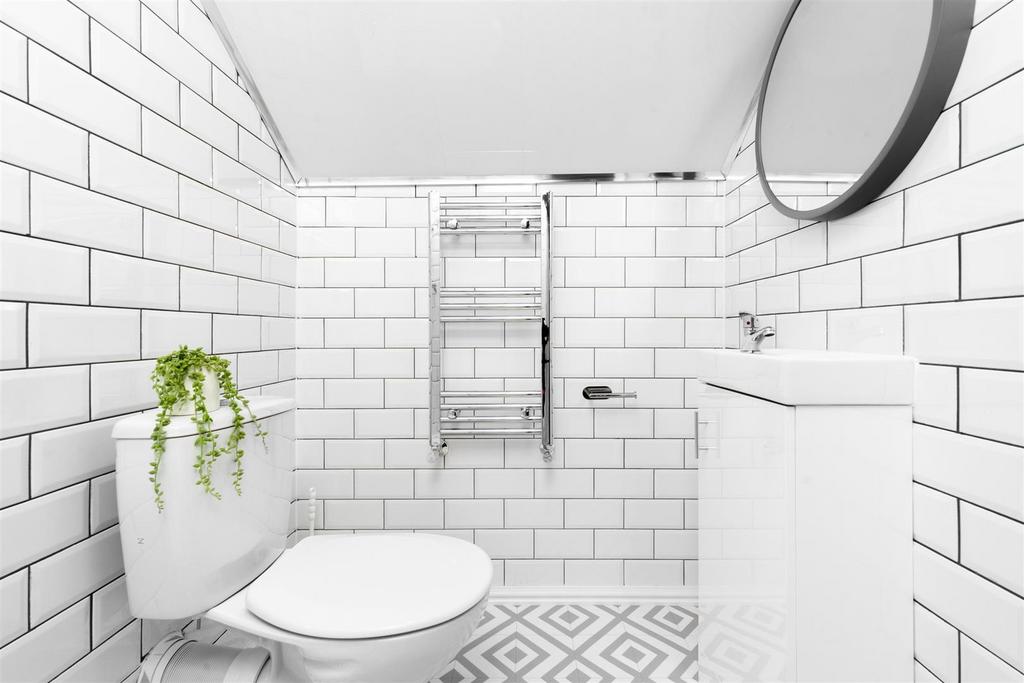 Bright modern washroom with stylish tiling...