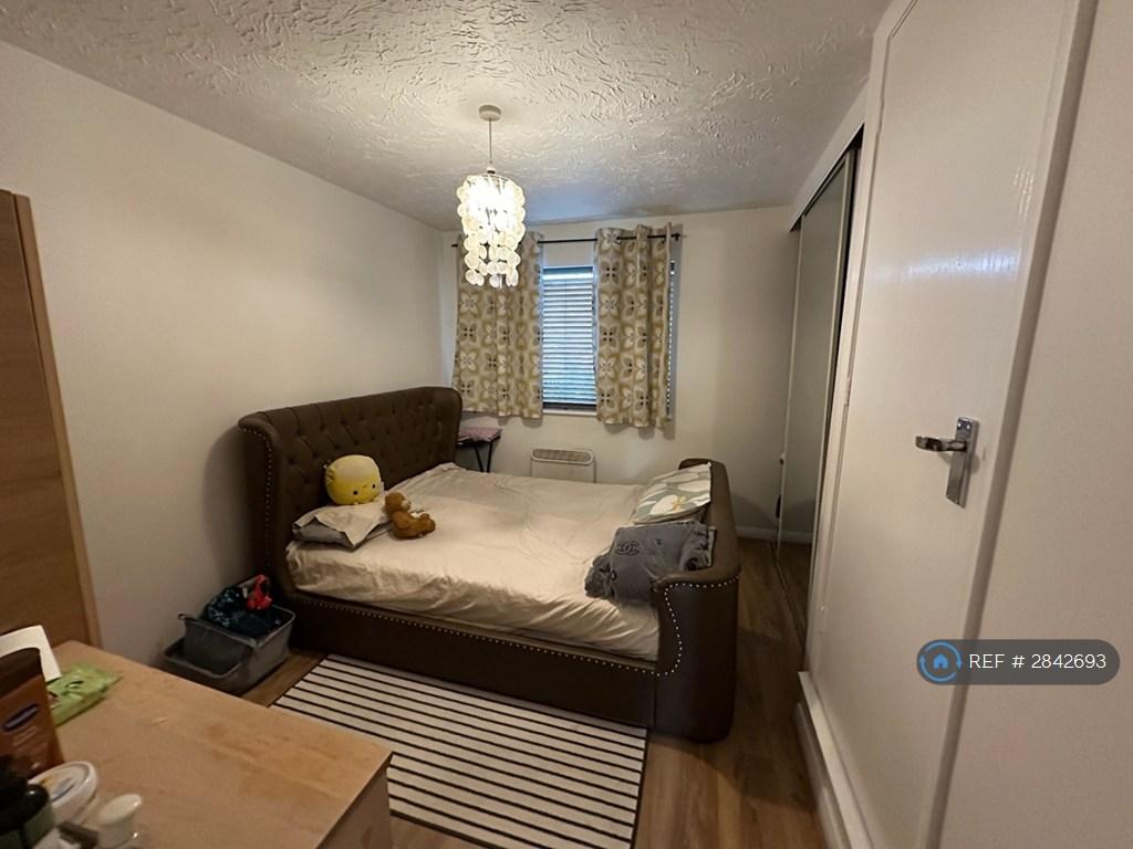 Main Bedroom With Sliding Glass Wardrobe