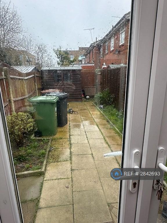 Rear Garden With Shed