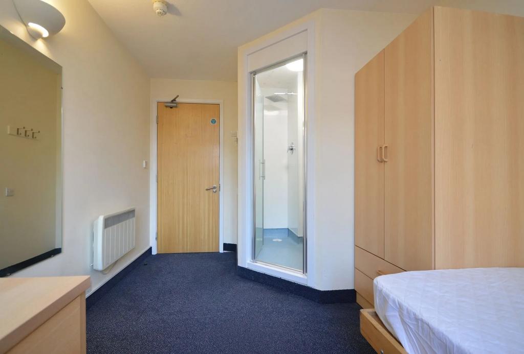 Bright bedroom with ensuite and ample storage...