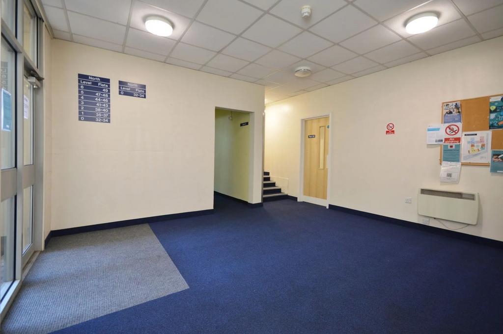 Spacious and tidy building entrance area...
