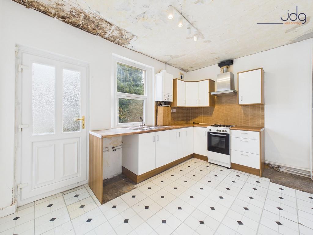Kitchen with ceiling being replastered and new...