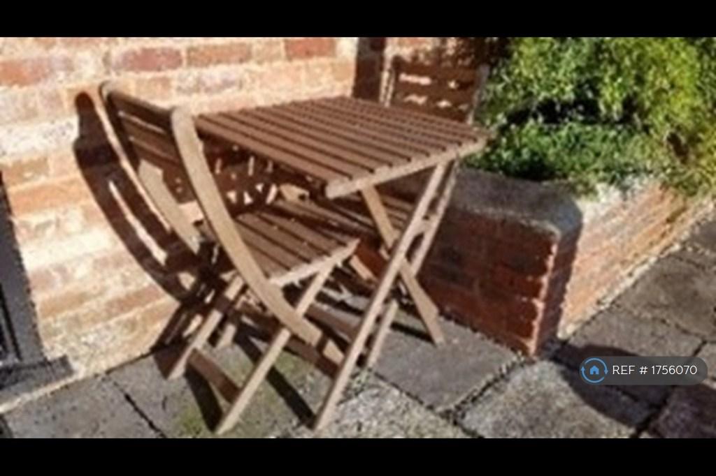 Outside Table And Chairs Near Front Door