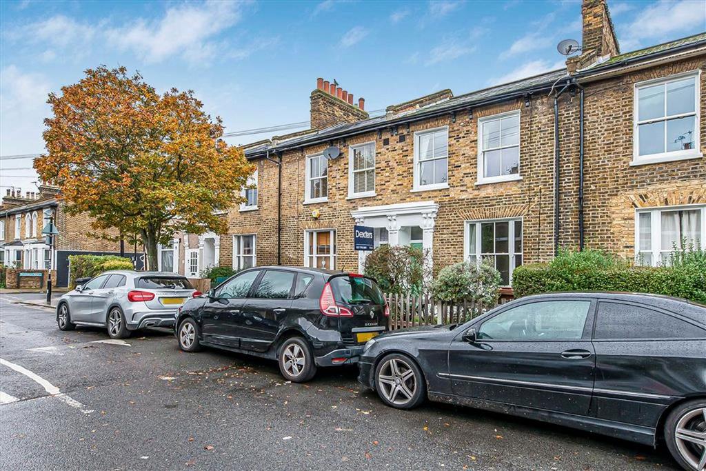 Street scene with property, parking