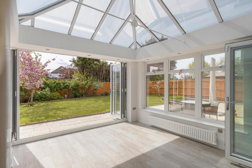 Conservatory interior, conservatory, french doors leading to garden
