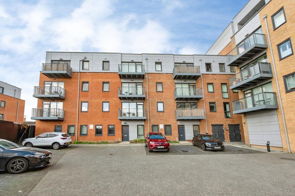 Apartment building facade, block of apartments, parking