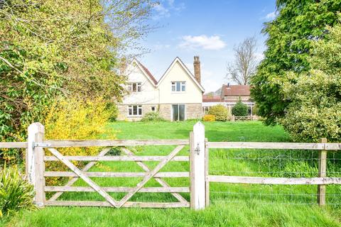 undefined, Four bedroom house with adjoining barns, outbuildings & two paddocks (3.92 acres.)