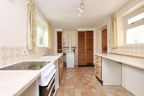 undefined, Four bedroom house with adjoining barns, outbuildings & two paddocks (3.92 acres.)