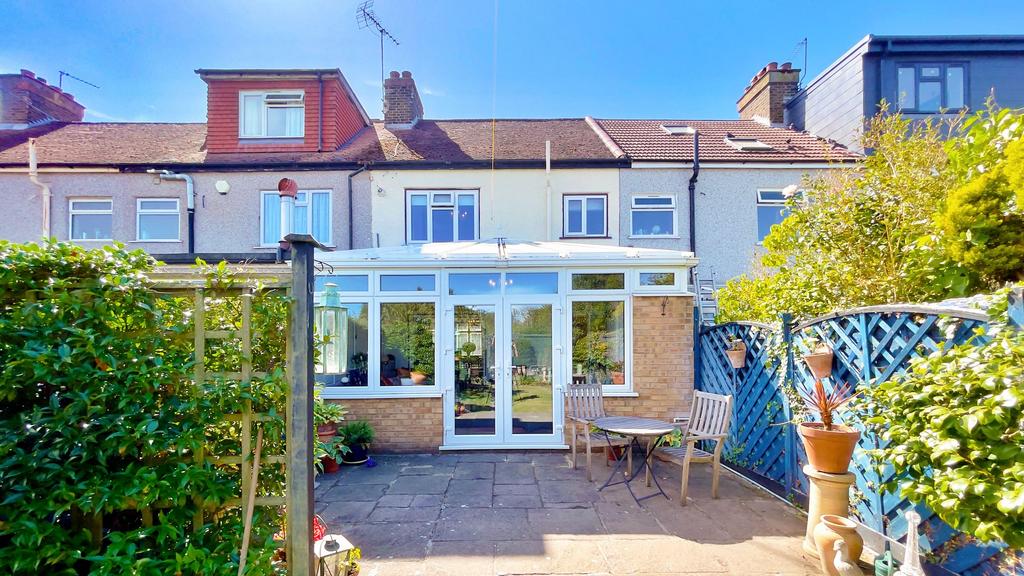 Conservatory interior, conservatory, french doors leading to garden