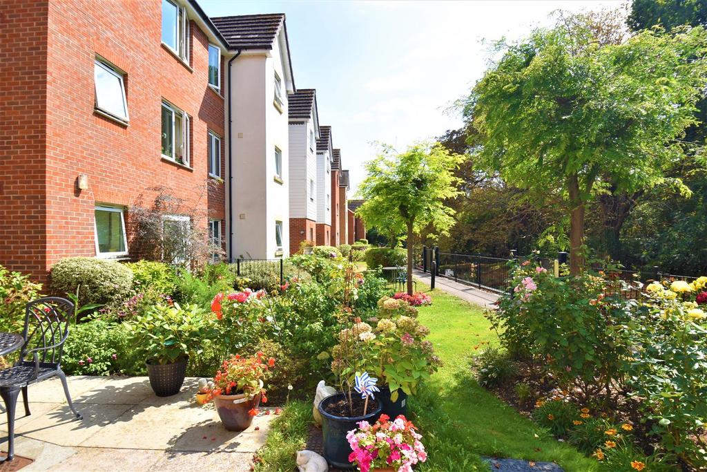 Street scene with property, garden