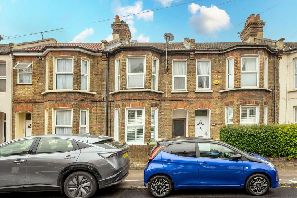 Terraced house exterior, parking