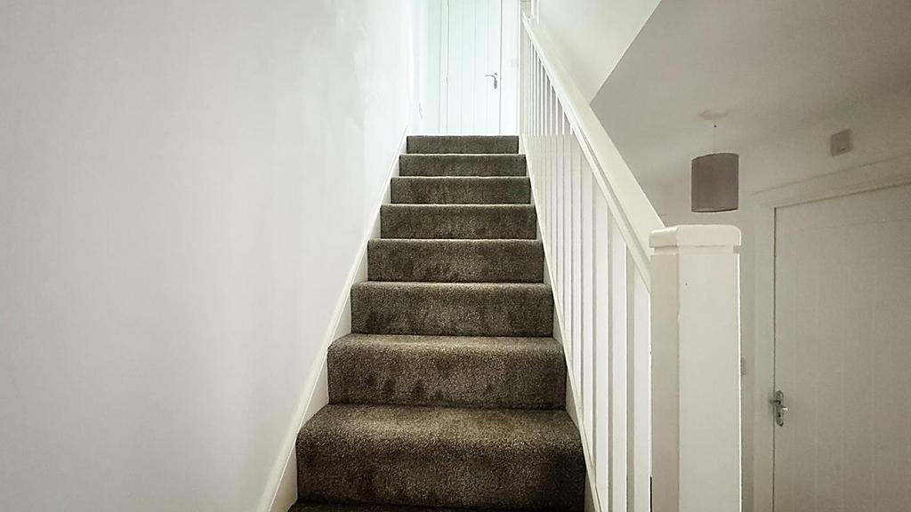 Stairs to second floor landing