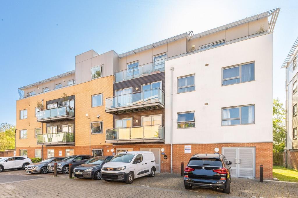 Apartment building facade, block of apartments, parking