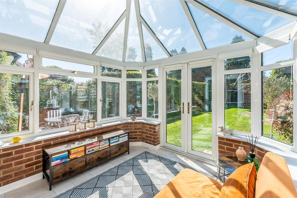 Conservatory interior, conservatory, french doors leading to garden