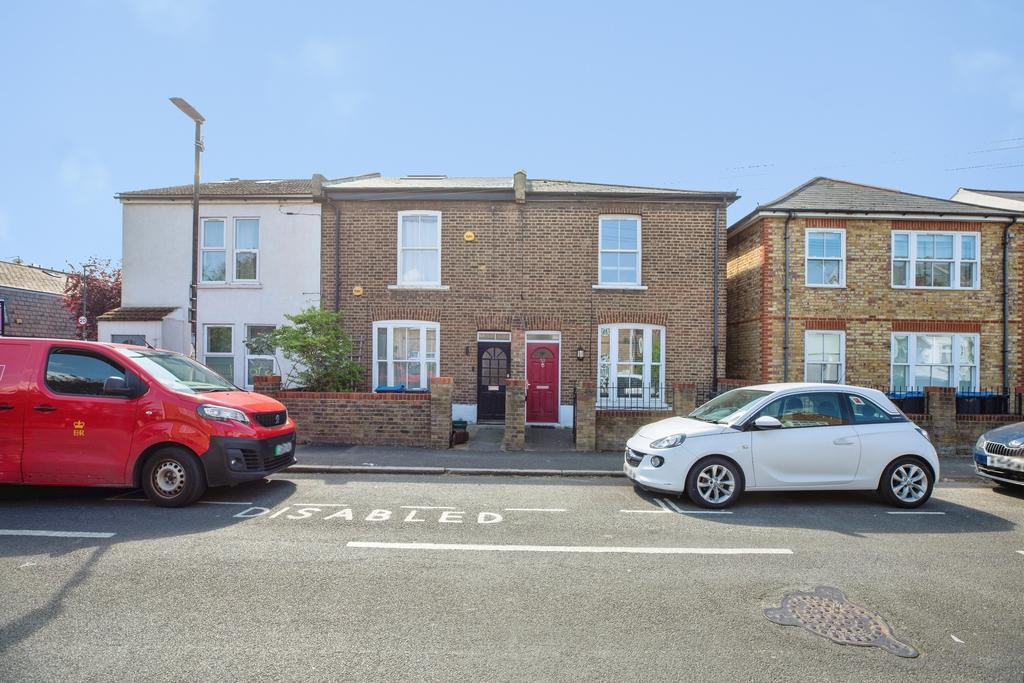 Street scene with property, parking