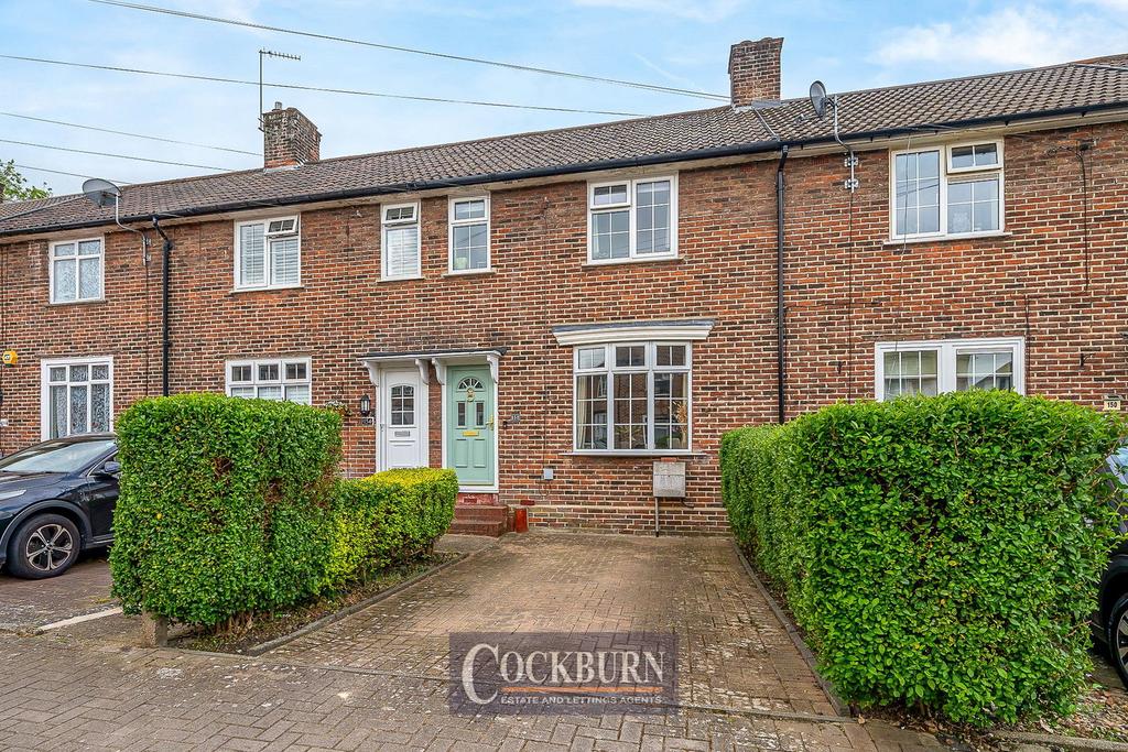 Terraced house exterior, parking