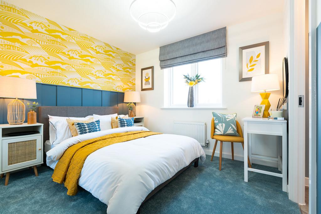 A cozy and vibrant bedroom with a yellow...
