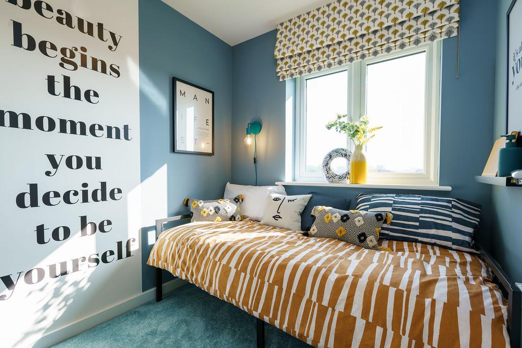 A cozy and vibrant bedroom with a patterned...