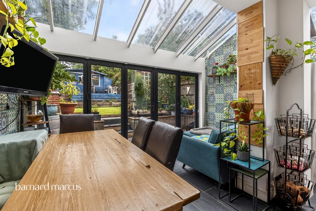 Conservatory interior, conservatory, french doors leading to garden