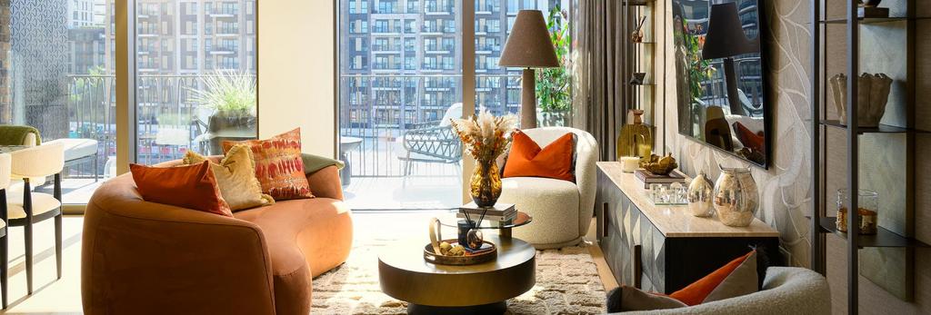 Modern living space with fabric seating, TV...