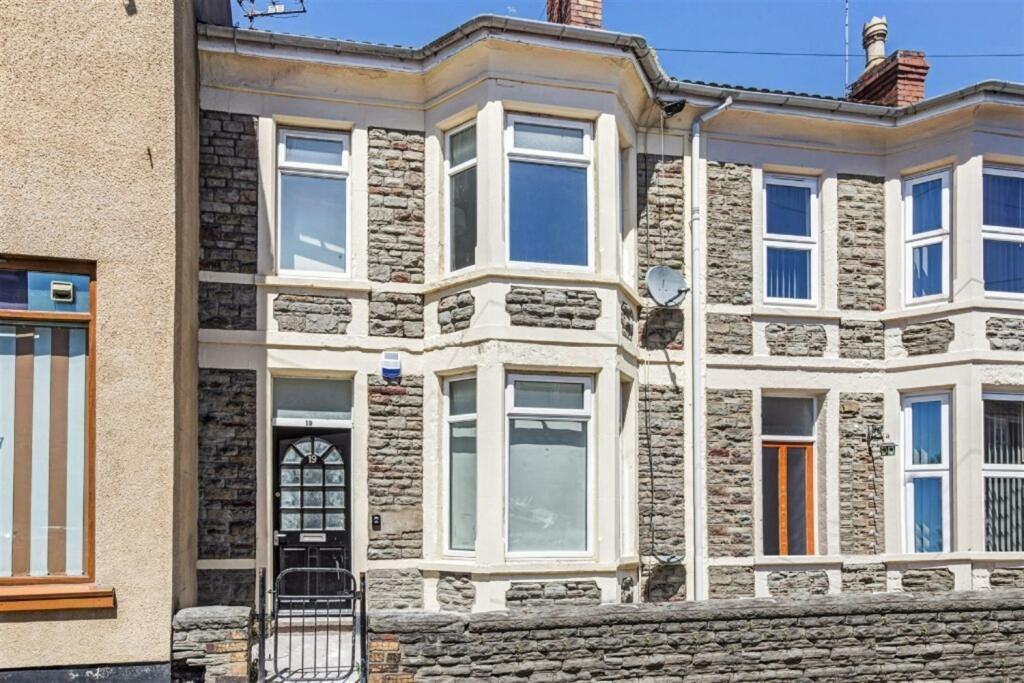 Charming stone-fronted home with large windows...