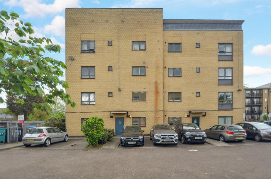 Apartment building facade, block of apartments, parking