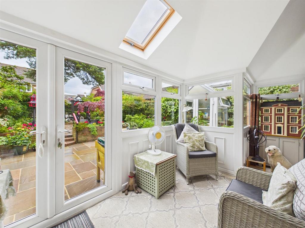 Conservatory interior, conservatory, french doors leading to garden