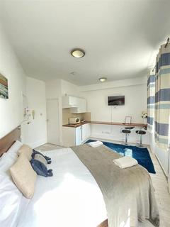 Studio to rent, Knaresborough Place, London SW5