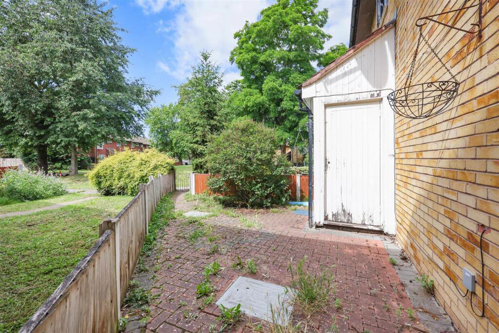 Driveway view, garage