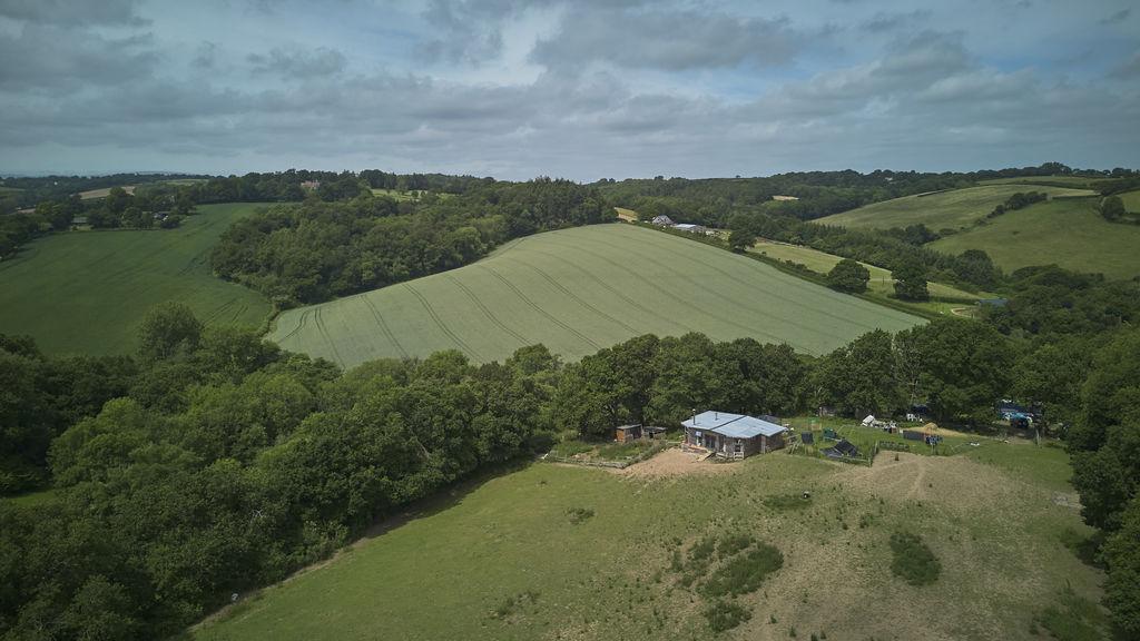 11 Acres with Off-Grid Chalet and Agricultural Potential