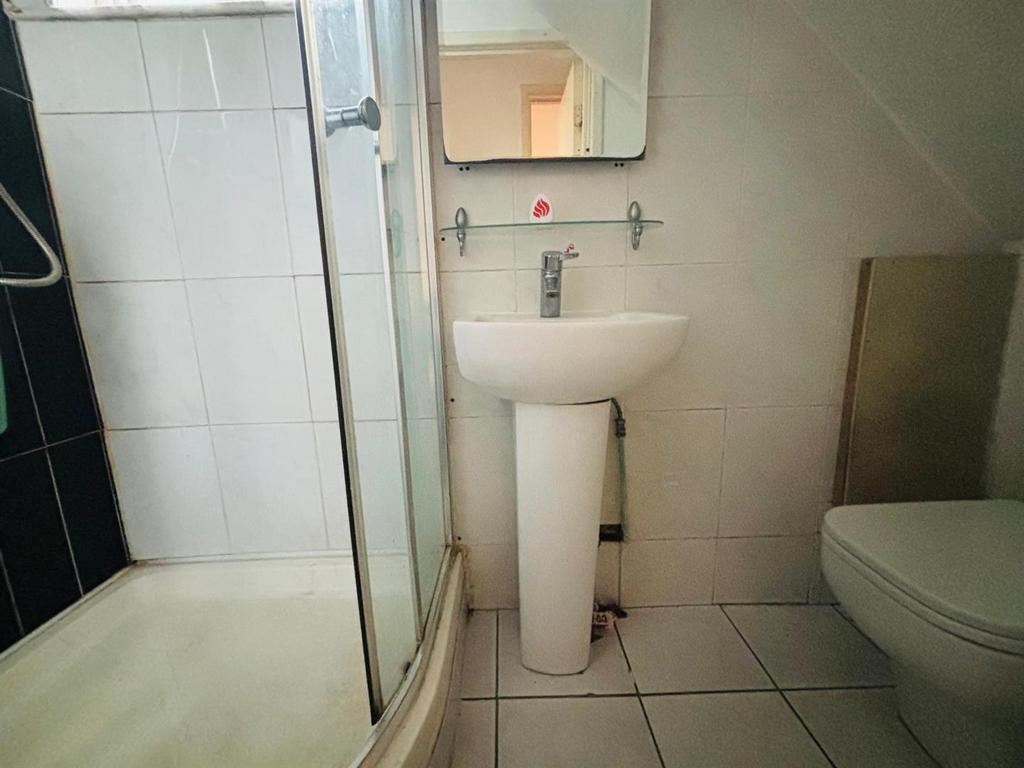 Downstairs WC / Shower Room: