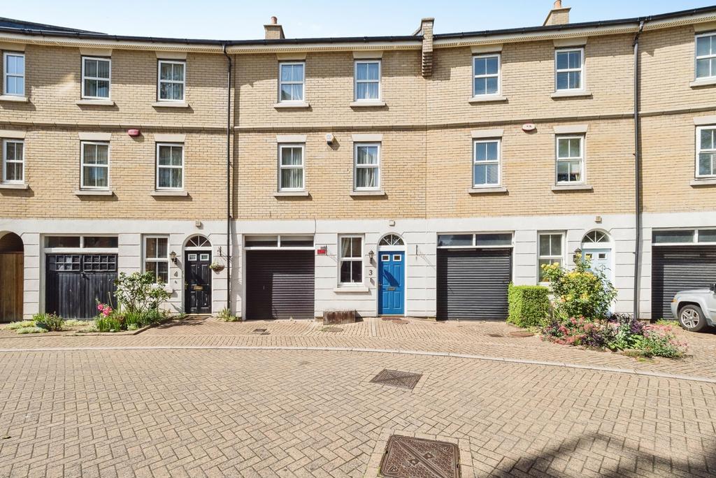 Street scene with property, garage