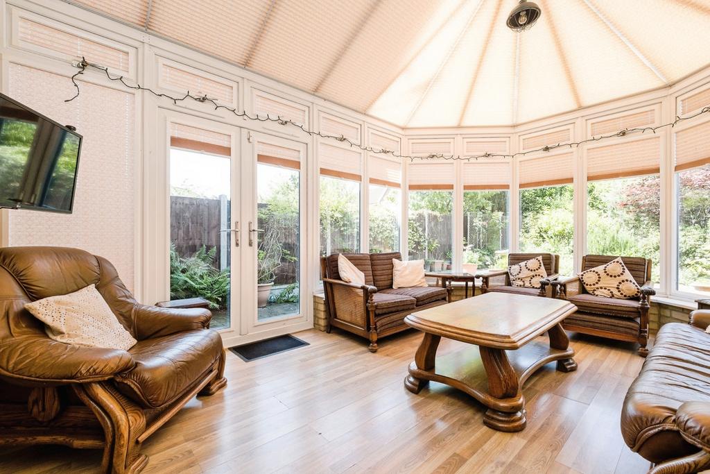 Conservatory interior, conservatory, french doors leading to garden