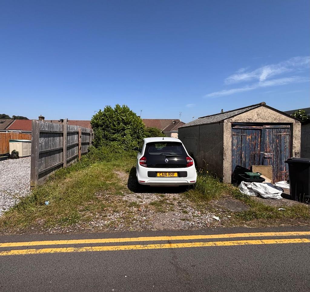 Driveway view, garage